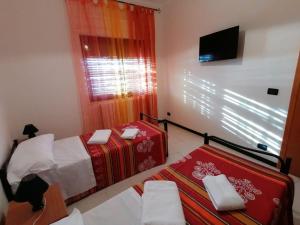 Posteľ alebo postele v izbe v ubytovaní Bed and breakfast lagiocosa