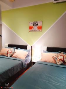 A bed or beds in a room at LovelyHome@Geo Linked BRT/Sunway/Medical 中文房东