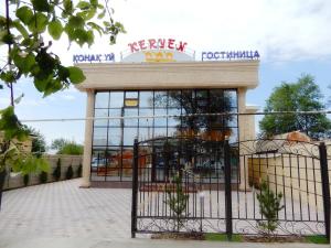 a building with a gate in front of it at Keruen in Taraz