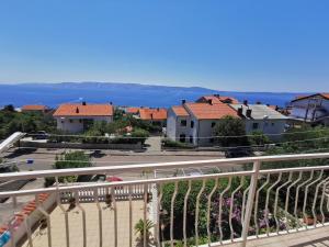 a view from the balcony of a house at Villa Clara apartments Kvarner in Novi Vinodolski
