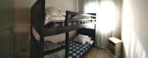 Postel nebo postele na pokoji v ubytování Piso Familiar en Llançà