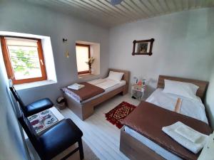 Postel nebo postele na pokoji v ubytování Kulla Dula Guesthouse
