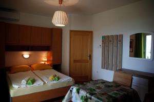 Postel nebo postele na pokoji v ubytování Apartements Magdalena