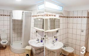 a bathroom with two sinks and a shower and a toilet at Ubytování v Brně - Schodová in Brno