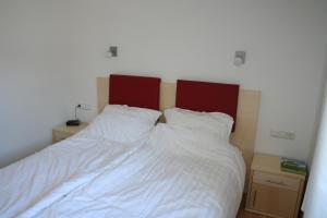 Postel nebo postele na pokoji v ubytování Appartement Enns by Schladmingurlaub