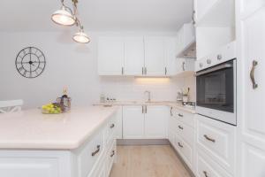 Kuchyňa alebo kuchynka v ubytovaní Apartman Slavice