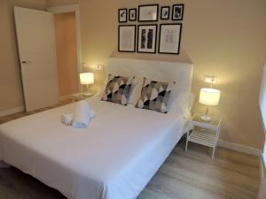 Cama o camas de una habitación en Casa Petra By DeLabra Apartments