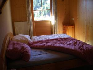 Posteľ alebo postele v izbe v ubytovaní Almrauschhütte Markus