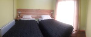 Postel nebo postele na pokoji v ubytování Quinta El Rosal