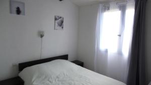 Postel nebo postele na pokoji v ubytování Port leucate T2 bis wifi les Sables 3