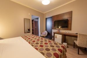Letto o letti in una camera di Class Hotel Varginha