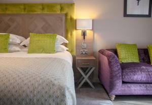 Cama ou camas em um quarto em Boulevard Hotel