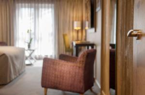 Cama ou camas em um quarto em Boulevard Hotel