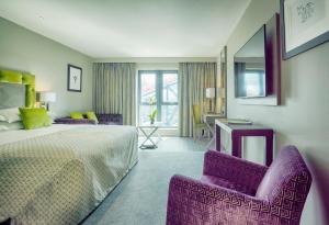 Cama ou camas em um quarto em Boulevard Hotel