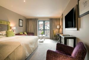 Cama ou camas em um quarto em Boulevard Hotel