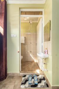 Koupelna v ubytování AnD Suites + 17 fotografií