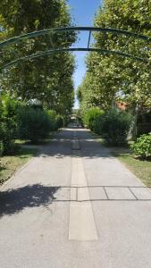 an empty road with a bridge over it at Résidence Parc de la mer - Apprt 3 chambres in Argelès-sur-Mer +7 photos