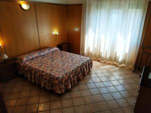 Posteľ alebo postele v izbe v ubytovaní Residence Hotel Valery
