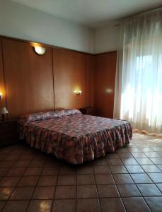 Posteľ alebo postele v izbe v ubytovaní Residence Hotel Valery