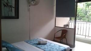 Postel nebo postele na pokoji v ubytování Hotel Shalom PHE Guaduas