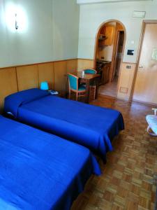 Posteľ alebo postele v izbe v ubytovaní Residence Hotel Valery