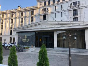 a building with a street light in front of it at Jermuk Hotel and SPA in Jermuk +98 photos