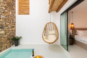 Postel nebo postele na pokoji v ubytování Obsession Mykonos