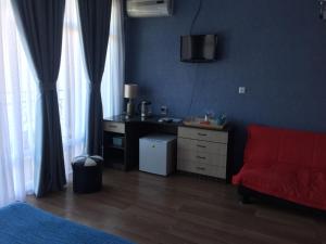 Area soggiorno di Guest House Smile