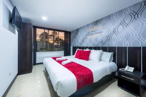 Postel nebo postele na pokoji v ubytování Hotel Boutique Markes + 20 fotografií