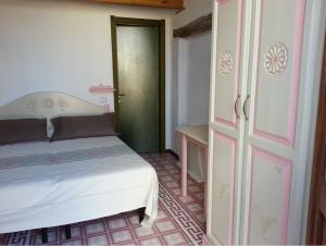 Postel nebo postele na pokoji v ubytování Sa Domu e Crakeras