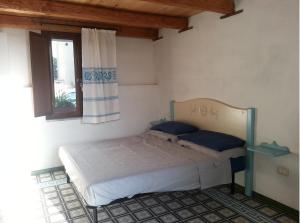 Postel nebo postele na pokoji v ubytování Sa Domu e Crakeras