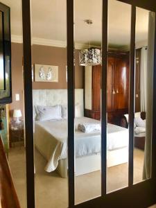 Un pat sau paturi într-o cameră la Estoril Best Apartment