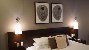 Voodi või voodid majutusasutuse Hotel Las Cascadas toas