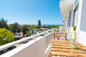 En balkon eller terrasse på Apartamento Praia Fuzeta