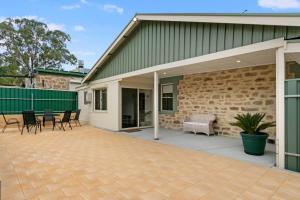 an extension to a house with a patio at Williamstown Bed and Breakfast in Williamstown