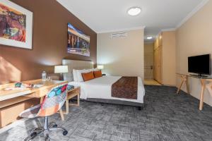 Kimberley Gardens Hotel, Serviced Apartments and Serviced Villas的电视和/或娱乐中心