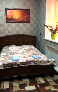 Кровать или кровати в номере Хостел Гости