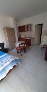 Kuchyň nebo kuchyňský kout v ubytování Apartmani Lana Rab