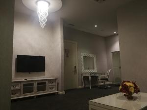 TV a/nebo společenská místnost v ubytování Casa Bianca