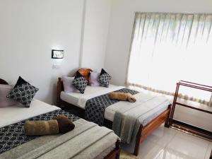 Cama o camas de una habitación en Polo Region Rest Inn