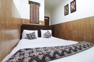 Lova arba lovos apgyvendinimo įstaigoje 58 Guesthouse Tangerang