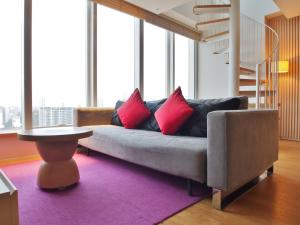 Uma área de estar em Hotel Madera Hong Kong