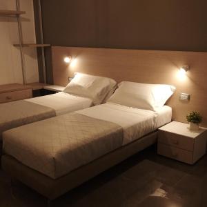 Postel nebo postele na pokoji v ubytování B&B La Rosa Felice