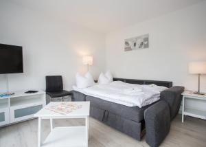 Postel nebo postele na pokoji v ubytování Appartement Brink Fichtenweg 41