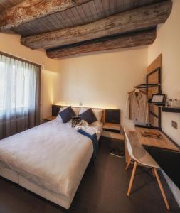 Кровать или кровати в номере Le Palme Rooms & Breakfast