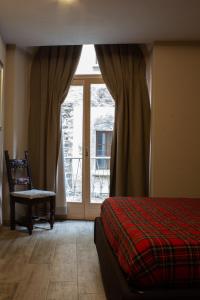 Ένα ή περισσότερα κρεβάτια σε δωμάτιο στο Casa Cater