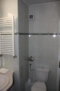 Koupelna v ubytování Hotel Sarmis + 11 fotografií
