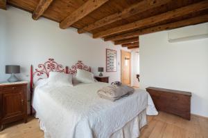 Postel nebo postele na pokoji v ubytování Regina nel cuore del Veneto