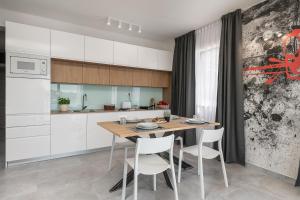 Dapur atau dapur kecil di Residence Alpha Apartments