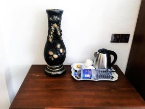 Удобства за правене на кафе и чай в The Amora